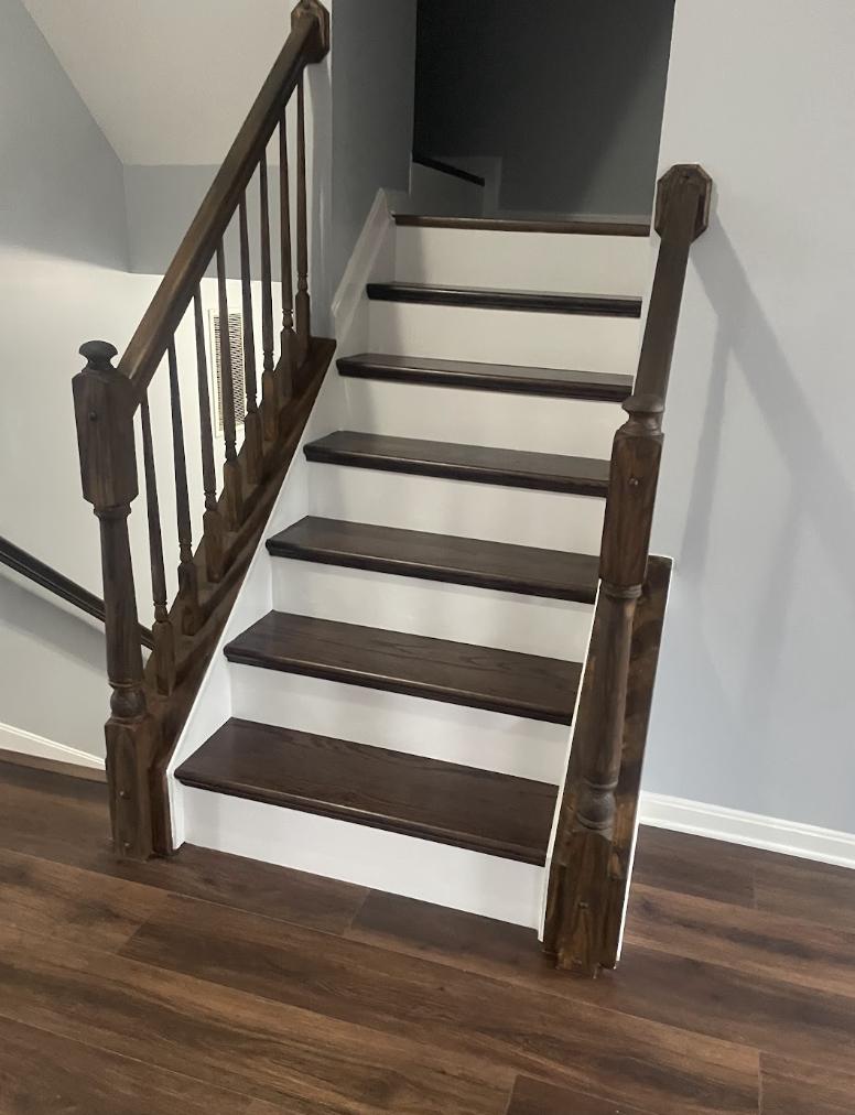 Staircase with stained oak treads and white risers